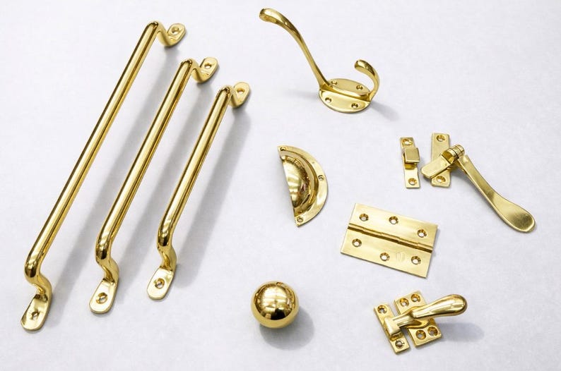 Uchwyty i gałki meblowe z litego mosiądzu – nielakierowane, polerowane okucia meblowe z mosiądzu zdjęcie 1