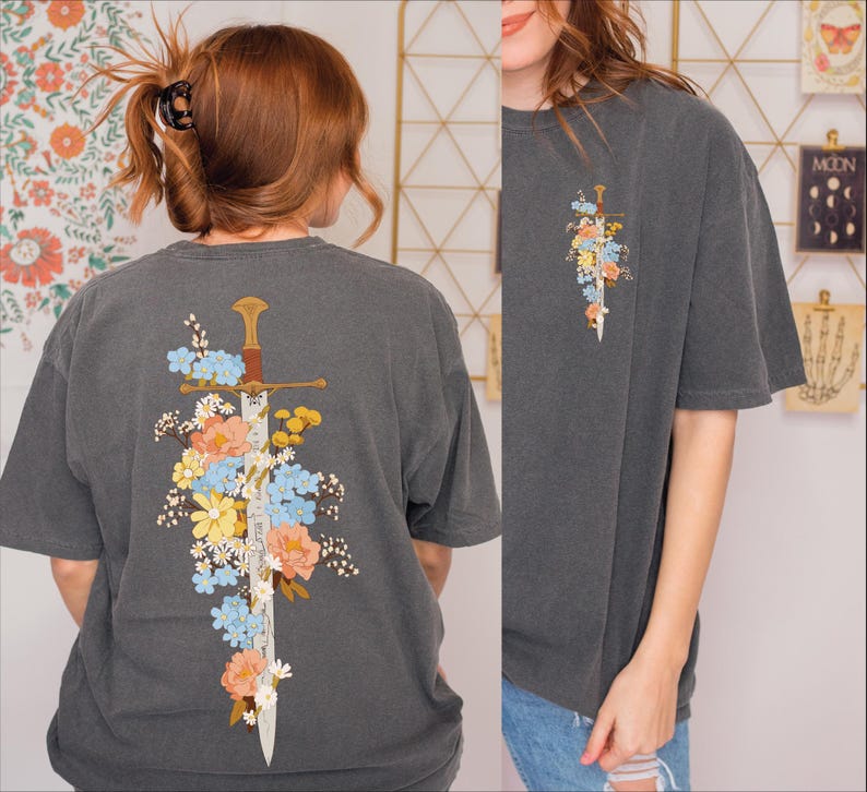 Lifestyle look at Floral Sword Shirt Front Back Print Cottagecore Wildflower Graphic Tee Women on Comfort Colors 1717. Soft vintage wash, oversized unisex fit, garment-dyed cotton gift tee.
