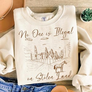 No One Is Illegal On Stolen Land Sweatshirt: Social Justice Activist Tee