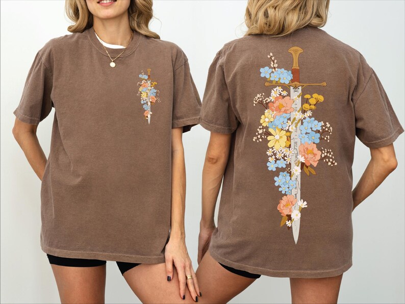 Another angle of Floral Sword Shirt Front Back Print Cottagecore Wildflower Graphic Tee Women on Comfort Colors 1717. Oversized vintage unisex tee, garment-dyed cotton, ready to gift.