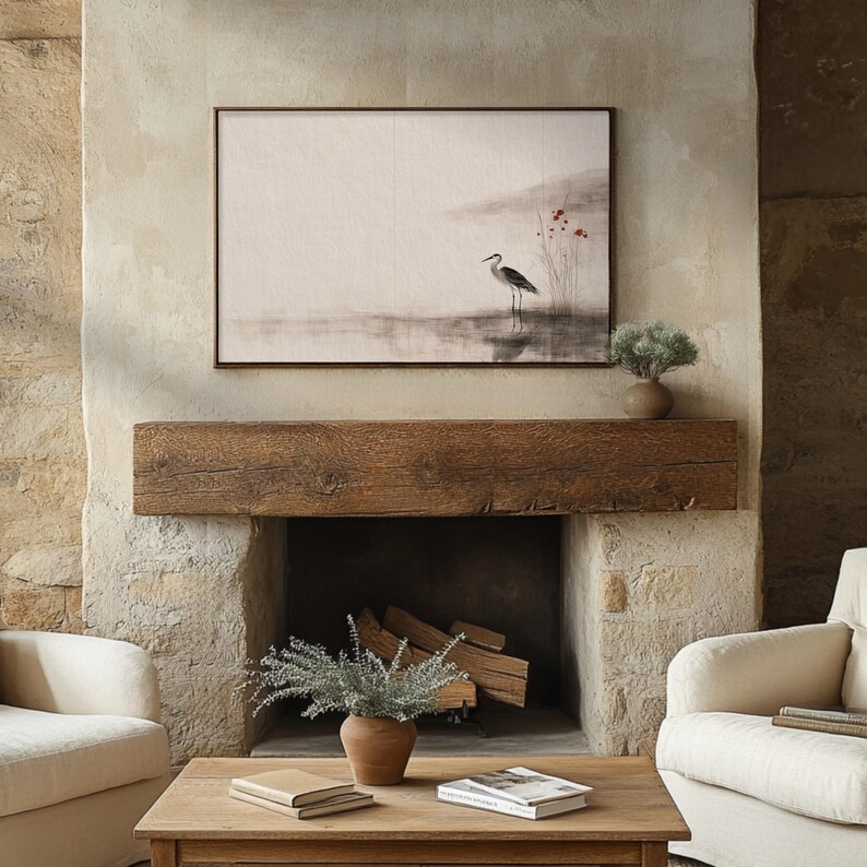 Japandi wall art digital print featuring a serene crane standing by calm water, surrounded by delicate red blossoms. Created in sumi-e ink style with earthy beige tones, it reflects Wabi Sabi simplicity and grace. Perfect printable artwork for minimalist or Scandinavian interiors.