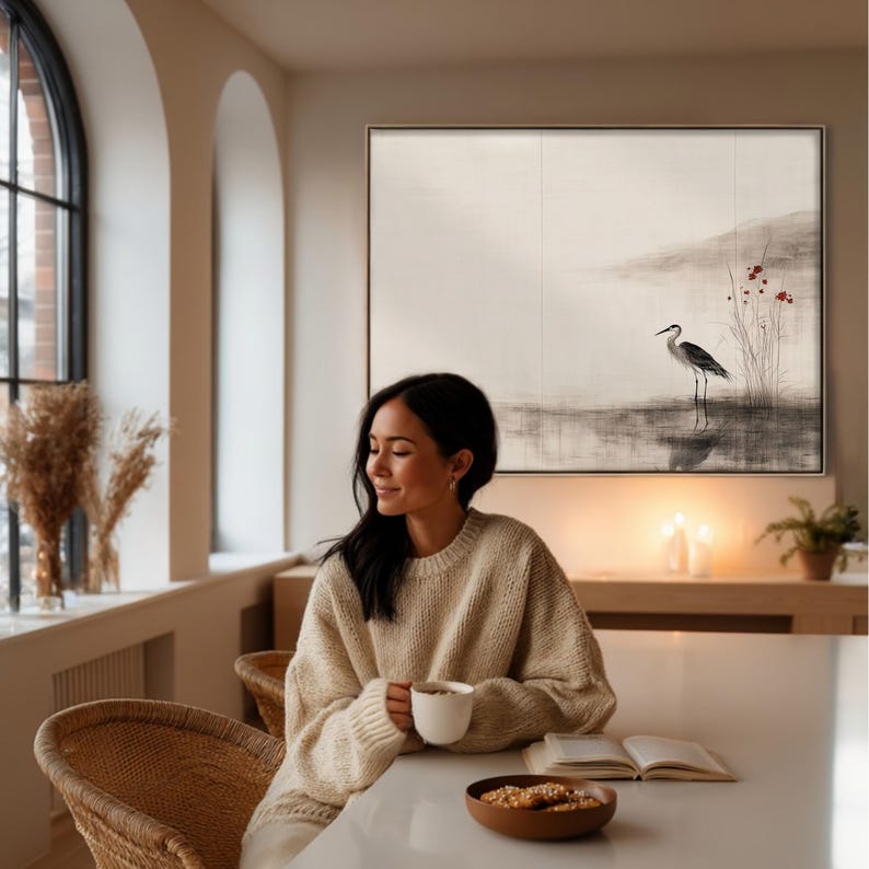 Elegant Japandi-inspired crane artwork in sumi-e ink painting style. The subtle red accents and muted earthy palette create a sense of stillness and natural beauty. Ideal printable wall decor for Wabi Sabi interiors or modern Scandinavian spaces.