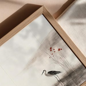 Serene Japandi wall art digital download featuring a white crane and muted red florals on a textured background. The ink painting embodies Wabi Sabi simplicity and timeless balance. Perfect for Scandinavian or zen home interiors.