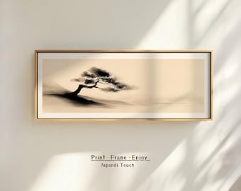 May include: A framed landscape art print featuring a minimalist black and white illustration of a windswept tree. The artwork is in a rectangular gold frame and is mounted on a white wall. The text "Print Frame Enjoy Japandi Touch" is below the frame.