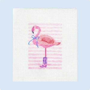 May include: A needlepoint canvas featuring a pink flamingo standing on one leg. The flamingo wears a blue bow around its neck and a purple patterned boot on its foot. The background consists of horizontal pink stripes on a white grid mesh canvas.