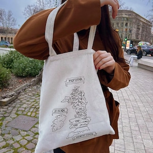Sac en tissu personnalisé Acotar, cadeau parfait pour amateur de lecture.