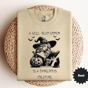 Sudadera de Halloween "Una mujer culta es una criatura peligrosa", suéter de bruja feminista, camiseta para amantes de los libros, camiseta de gusano de biblioteca, camiseta de club de lectura