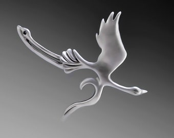 May include: A silver-toned, stylized bird sculpture with a long neck and outstretched wings. The bird is in flight, with its head tilted slightly to the side.