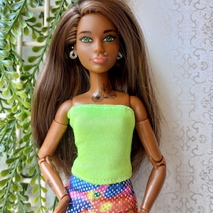 Ooak Barbie mtm doll with tattooes and piercings; Barbie fashionistas Daisy face mold, repainted and rerooted with saran hair
