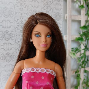 Ooak Barbie mtm doll; top model resort Barbie doll, Mackie face mold, on regular made to move body; rerooted with saran hair