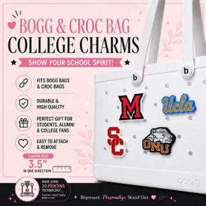 May include: A white tote bag featuring four colorful college-themed charms attached to its perforated surface. The charms display the letters M, Ucla, Sc, and Onu. Text on the image includes BOGG & CROC BAG COLLEGE CHARMS and a 3.5-inch size label.