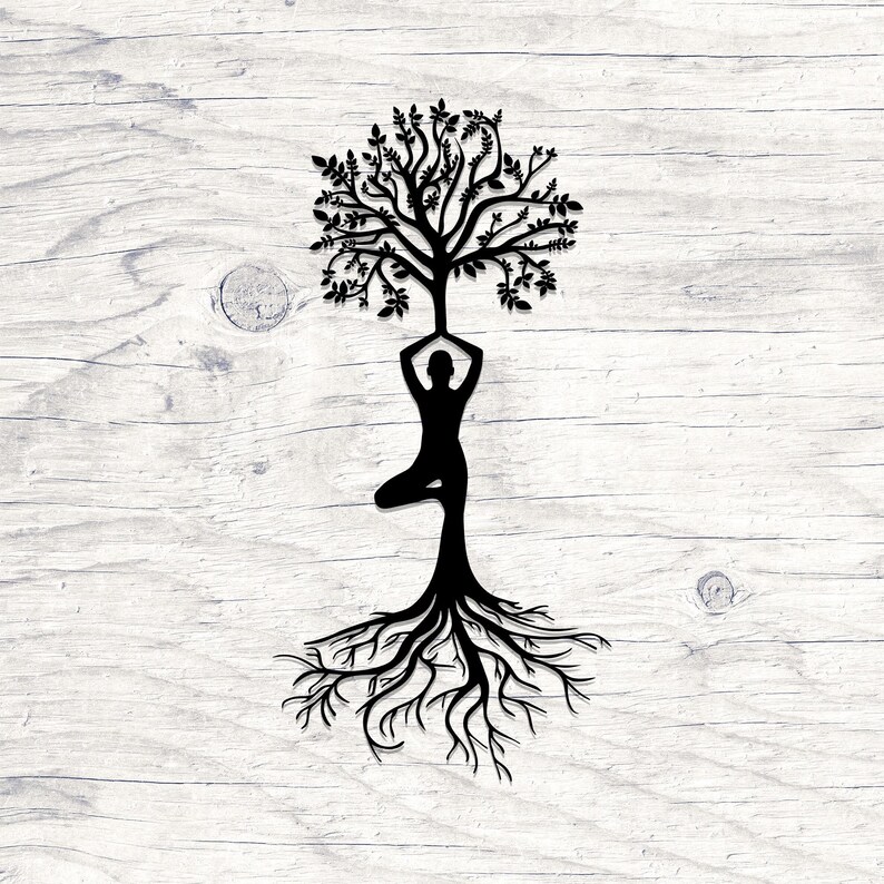 May include: A black silhouette of a person in a yoga pose with a tree growing out of their head and roots extending from their feet. The background is a white wood grain.
