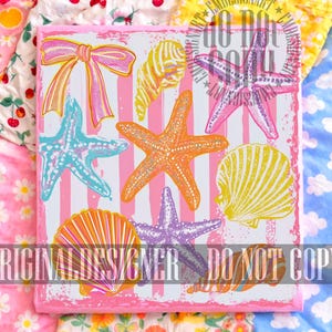 May include: A square artwork with a pink frame, showcasing a variety of colourful starfish, seashells, and a bow set against pink and white stripes. The artwork includes the text "ORIGINAL DESIGNER DO NOT COPY".