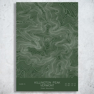 May include: A green and white topographic map print of Killington Peak, Vermont. The print includes the peak's elevation of 4,229 ft, coordinates, and the text "Green Mountains". The map features contour lines and is set against a dark green background.