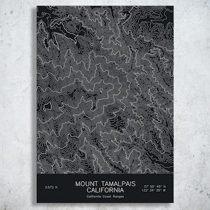 May include: A rectangular wall art print featuring a black background with intricate white topographic contour lines of Mount Tamalpais, California. The text reads: MOUNT TAMALPAIS CALIFORNIA, 2,572 ft, and the coordinates 37 55 45 N 122 34 35 W.
