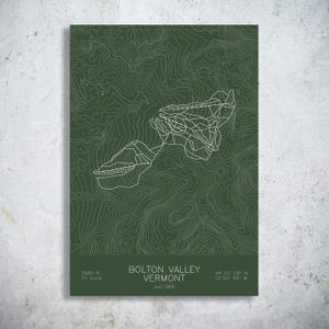 May include: A dark green topographic map print of Bolton Valley, Vermont, featuring white contour lines and ski trail paths. The text reads BOLTON VALLEY VERMONT, est 1966, 3680 ft, 71 trails, and coordinates 44 25 18 N 72 50 55 W in white.