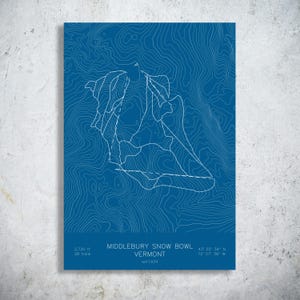 May include: A blue print featuring a white topographic map of Middlebury Snow Bowl in Vermont. The text reads Middlebury Snow Bowl, Vermont, est 1934, 2,720 ft, 28 trails, and coordinates 43° 55' 39" N, 72° 57' 38" W. The design includes white contour lines.