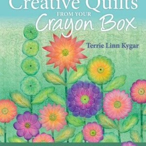 May include: A book cover titled "Creative Quilts from Your Crayon Box" by Terrie Linn Kygar. The cover features a colorful floral design with various flowers in shades of pink, orange, purple, and yellow against a green background. The text "Melt-n-Blend Meets Fusible Appliqué" is also present.