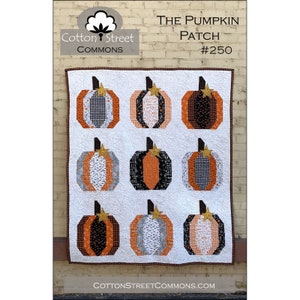 May include: A quilt pattern featuring nine pumpkin designs in orange, black, white, and gray. The pattern is titled "The Pumpkin Patch #250" and is from Cotton Street Commons.