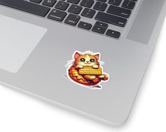 May include: A cartoon sticker of a cat wearing a donut and holding a sign that says "Maybe Later but Don't count on it".