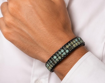 Handgemaakte turquoise kralenarmband, hematietaccent, magnetische sluiting