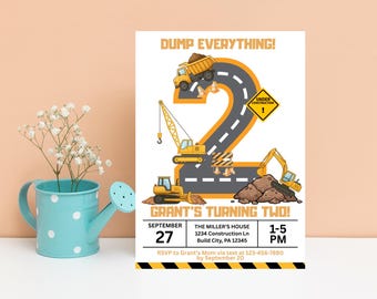 May include: A white birthday invitation with a construction theme. The number 2 is designed as a road with construction vehicles. Text includes "DUMP EVERYTHING!" and "GRANT'S TURNING TWO!" with event details.