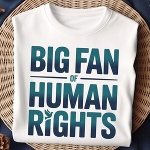 shirt with bold “Big Fan of Human Rights” quote in gradient blue-green letters, featuring a peace dove icon; perfect for social justice advocates, activism events, equality supporters, and human rights awareness.