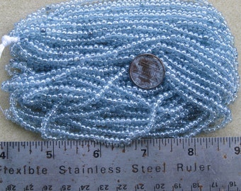 Czech Jablonex Ornela Preciosa seed beads, lumi blue, 6/0, full hank, temporarily strung