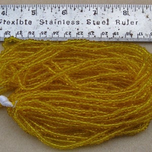 Czech Jablonex Ornela Preciosa seed beads, citrine color, 6/0, one full hank, temporarily strung image 2