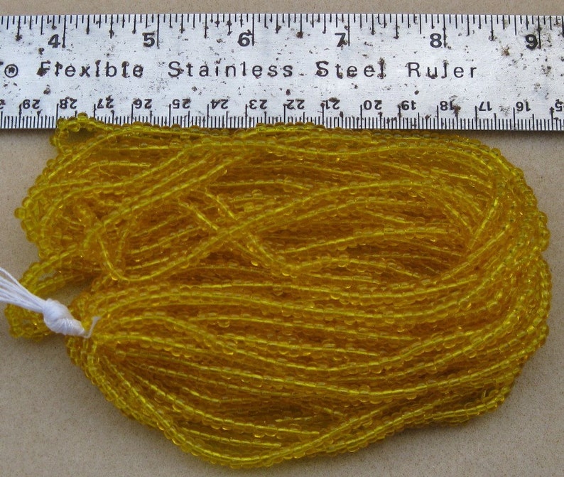Czech Jablonex Ornela Preciosa seed beads, citrine color, 6/0, one full hank, temporarily strung image 2