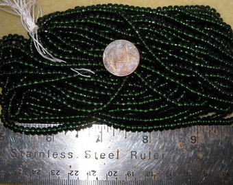 Czech Jablonex Ornela Preciosa seed beads, dark olivine, 6-ought, 4mm, full hank, dark green, temporarily strung