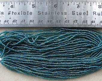 Czech Jablonex Ornela Preciosa seed beads, emerald AB, 11/0, 1 full hank, temporarily strung