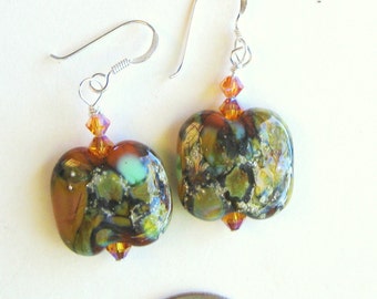 Sterling silver dangle earrings made with SRA lampwork pillow frit beads and topaz color AB2X Swarovski crystals