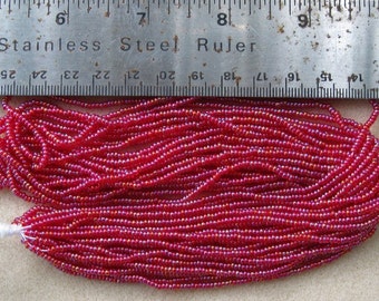 Ornela seed beads, ruby AB, 11/0