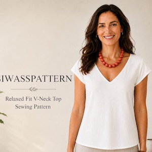 May include: A white short-sleeved top with a V-neckline. The text SIWASSPATTERN Relaxed Fit V-Neck Top Sewing Pattern is visible on the left side. The garment is worn with a necklace featuring round, reddish-orange beads.