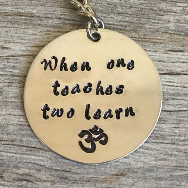 gift for yoga teacher, yoga, yoga quote, namaste, om, yogi, yoga gifts, yoga gift for teacher, when one teaches two learn, yoga accessories