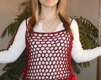May include: A red and black crocheted top with a scalloped hem and thin straps. The top is worn over a white shirt.
