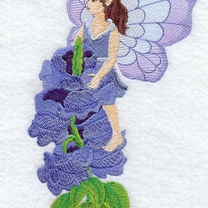 May include: A purple fairy with wings sits on a purple flower with green leaves. A yellow and black bee flies in the background.