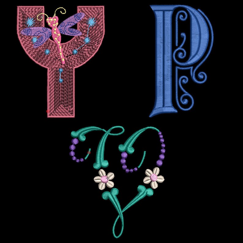 May include: Embroidered letters "Y" and "P" with a decorative heart design. The "Y" is pink with a dragonfly in the centre. The "P" is blue with a decorative flourish. The heart is green with purple beads and white flowers.
