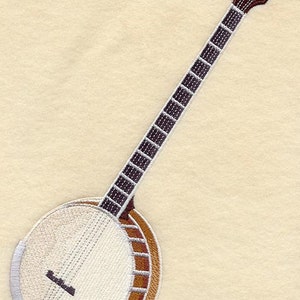 May include: A brown and white banjo with a wooden body and a long neck. The banjo has a round, white head with a silver tuning peg and a silver string.