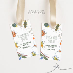 May include: Two white thank you tags with a bug theme. The tags are 2 inches by 3.5 inches and feature colorful illustrations of various bugs. The text on the tags reads "Thank You" and "For celebrating with me from Elijah".