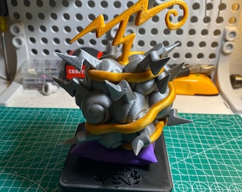 May include: A 3D-printed sculpture featuring a stylized design. The sculpture has a gray, spiky orb shape with a yellow lightning bolt on top. A yellow band wraps around the orb, and it rests on a black base with a purple cushion.