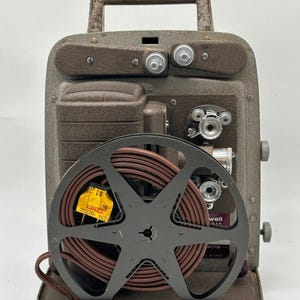 Appareil photo oculaire électrique Vintage Bell & Howell 8 mm avec