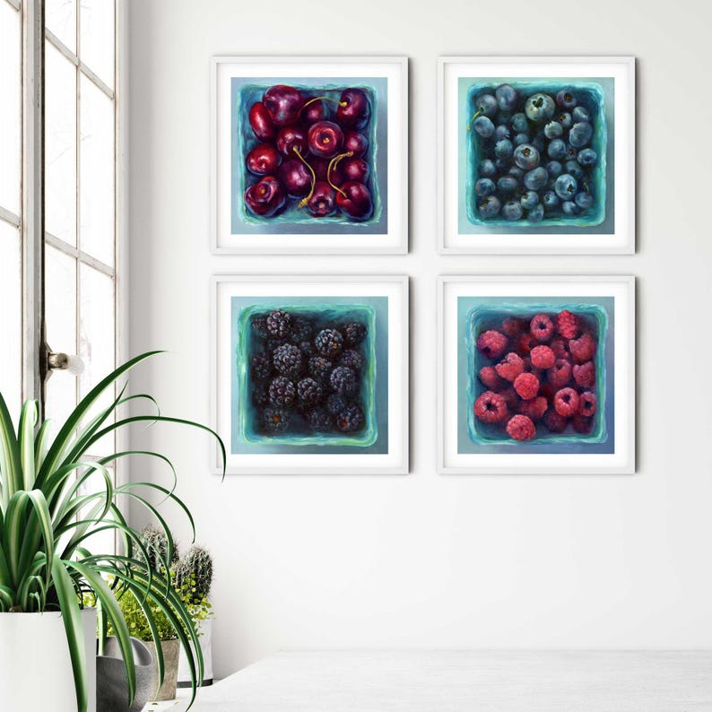 Set of 4 summer berry boxes on a bright modern kitchen or dining room wall by a large window with plants