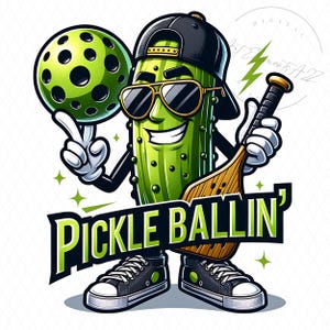 May include: A cartoon illustration of a pickle character wearing sunglasses and a backward baseball cap, holding a pickleball and a paddle. The text "PICKLE BALLIN'" is displayed in green and black. The character is wearing black sneakers.