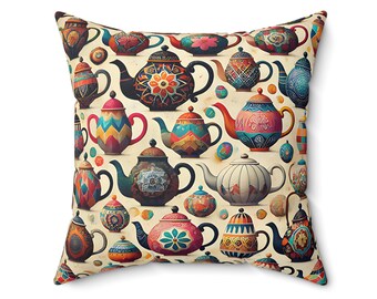 May include: A colorful throw pillow featuring a pattern of various teapots with intricate designs and vibrant colors on a cream background.