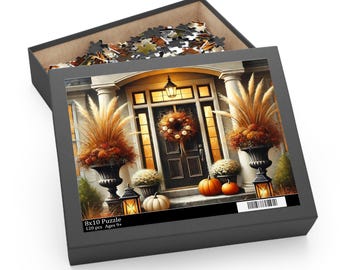 May include: A 120-piece puzzle in a black box, featuring a fall-themed image of a front door decorated with pumpkins, a wreath, and ornamental grasses. The box is labeled "8x10 Puzzle" and "Ages 9+".