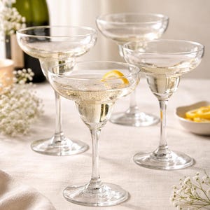 May include: A rustic wooden sign with the text "Welcome to our home" in white lettering. The sign features a distressed finish and a simple, inviting design, perfect for front door decor.