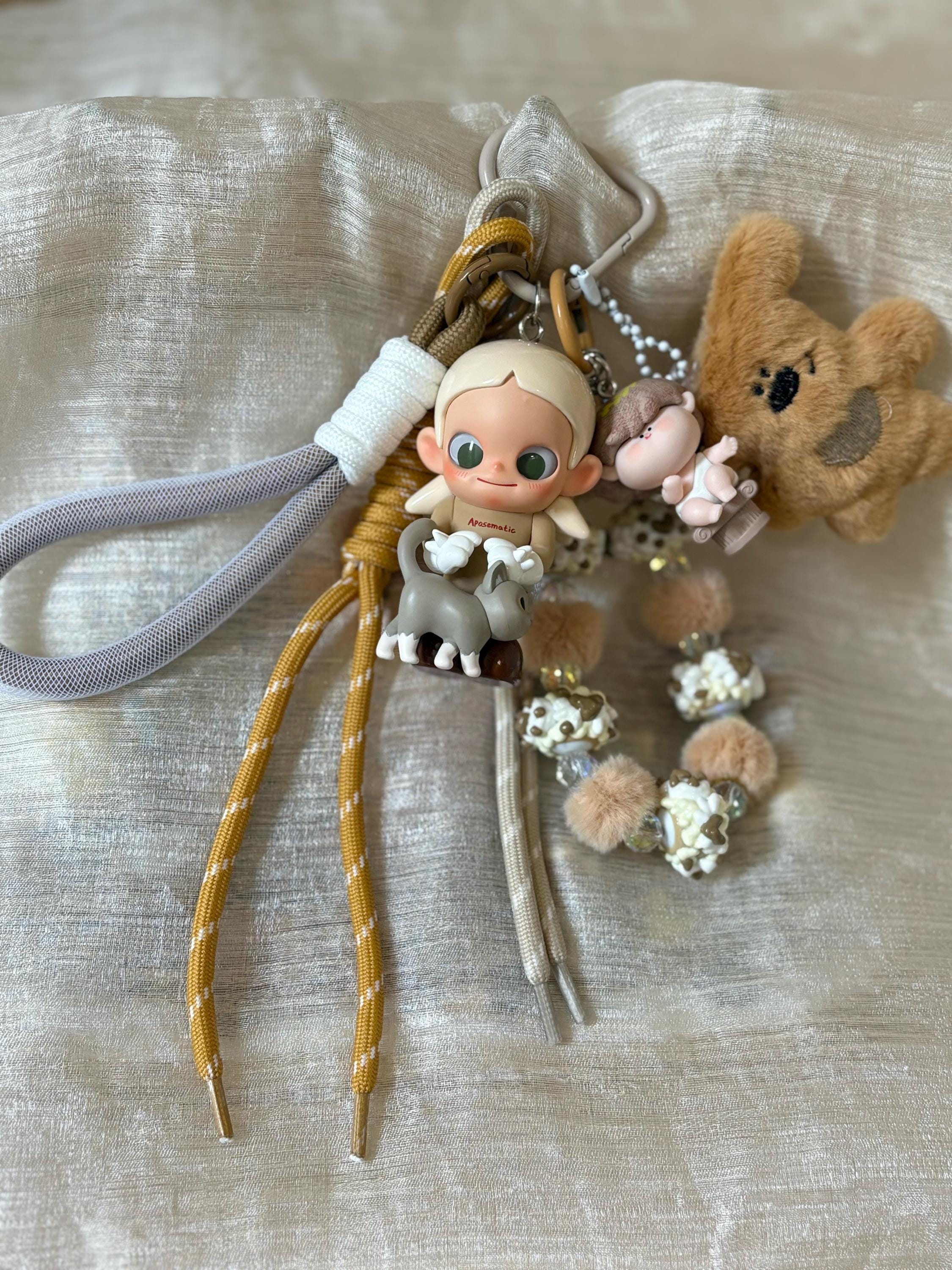 miumiuレザートニック キーチェーン キーホルダー Miu miu bag charms - Etsy 日本