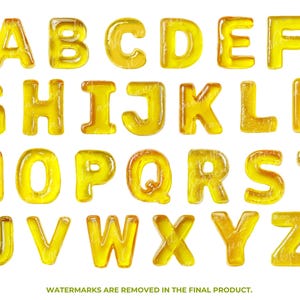 May include: A full alphabet of yellow, translucent letters, each with a rounded, bubbly appearance. The letters are arranged in rows, from A to Z, against a white background. The image is well-lit, highlighting the texture of the letters.